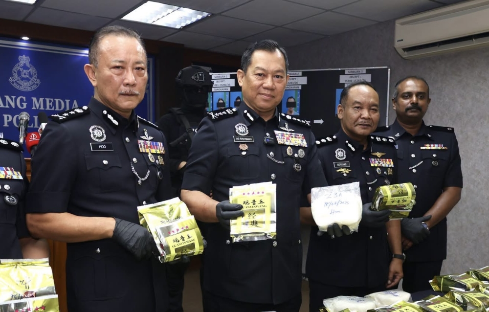 Eight arrested after police dismantle drug network operating from elderly man's car in Johor Bahru