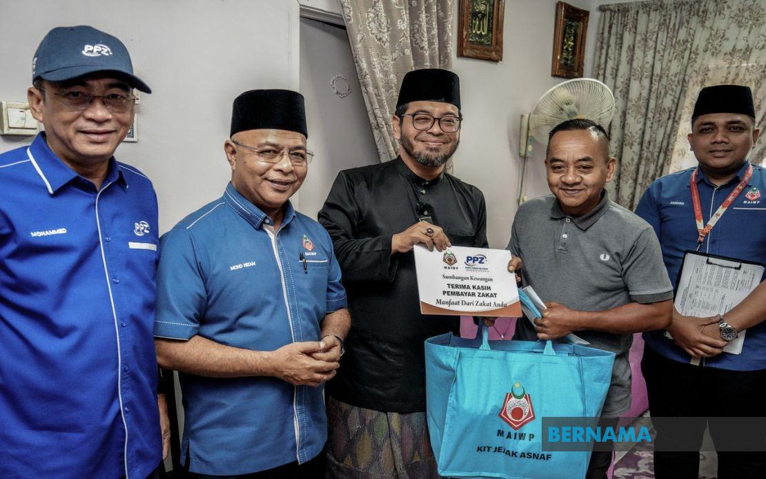 MAIWP Extends Financial Support to Widow Raising Five Children Following Husband's Death