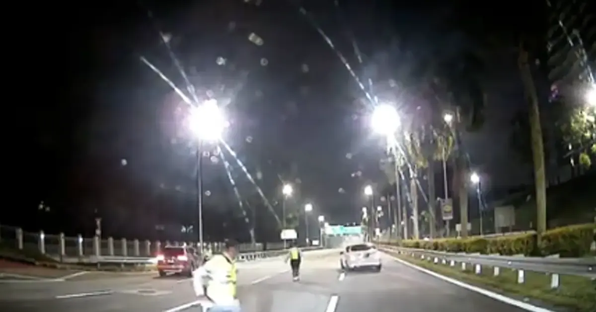 Young Driver Arrested for Forcing Through Police Roadblock