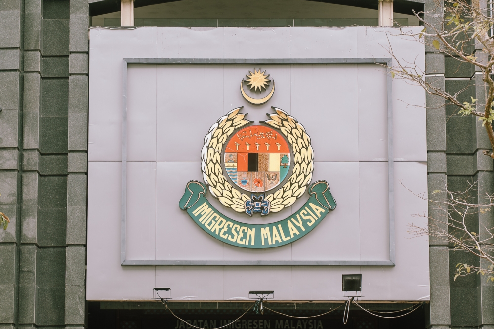 Immigration authorities smash KL passport forgery ring, arrest three Indonesians and recover 119 fake documents