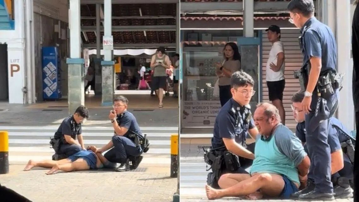 Man arrested in Singapore after obscene act and assault on police officer