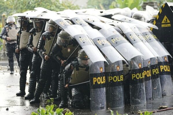 Indonesia's security agencies clash over graft probe as military deploys to prosecutor's home