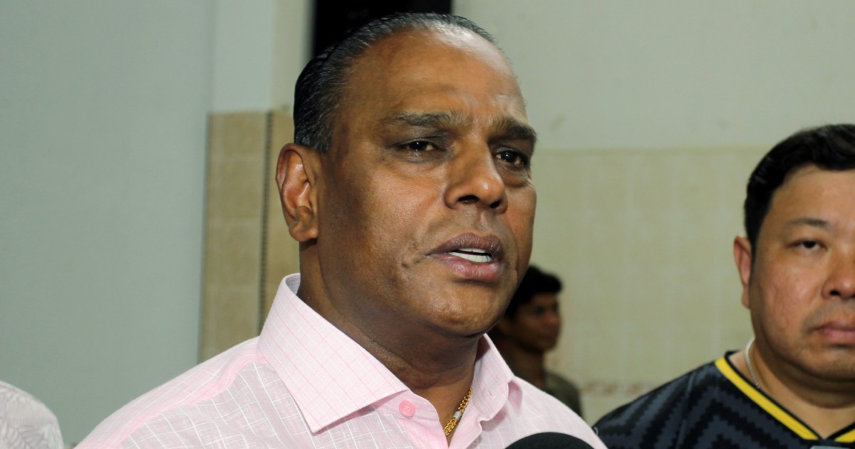 Black-clad supporters fill courthouse as ex-HR minister Saravanan faces corruption charges