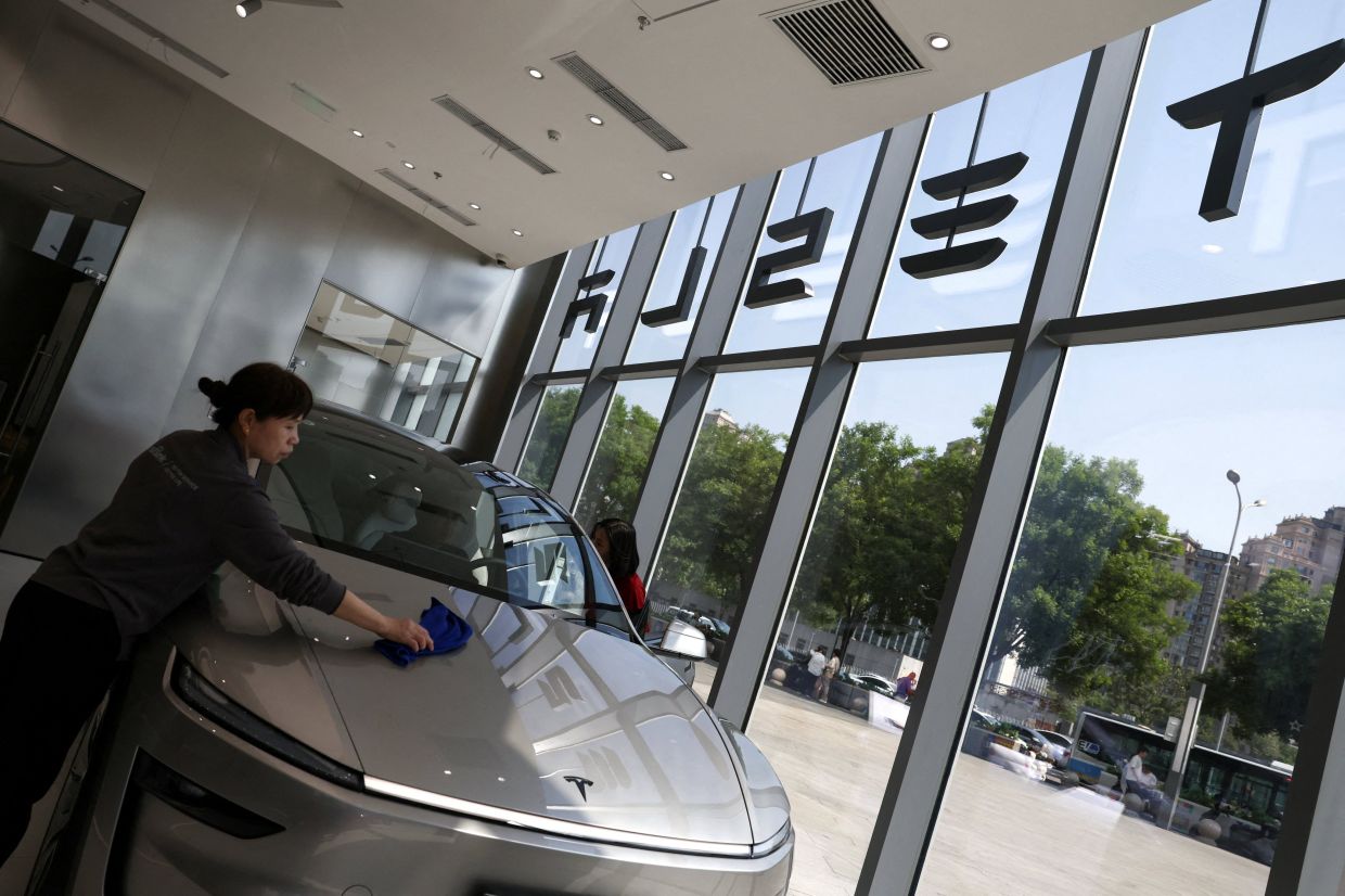 Tesla hit with record 3 million vehicle recall in China over door-handle safety flaw