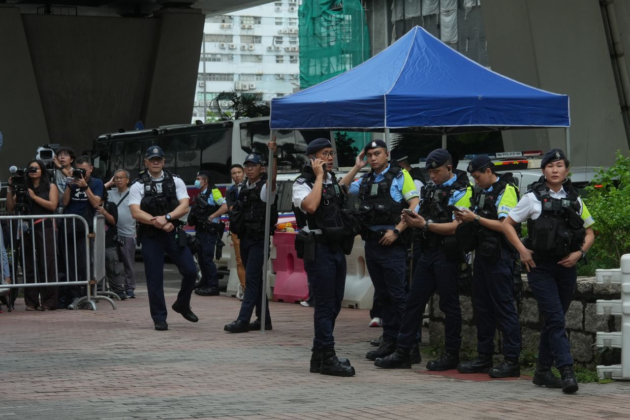 Hong Kong Woman Detained Over T-Shirt Message as Court Delivers Sedition Verdict