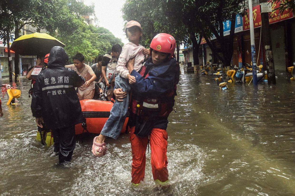 China's Summer Fury: Typhoon and Landslides Kill Dozens as Rescuers Battle Flooding