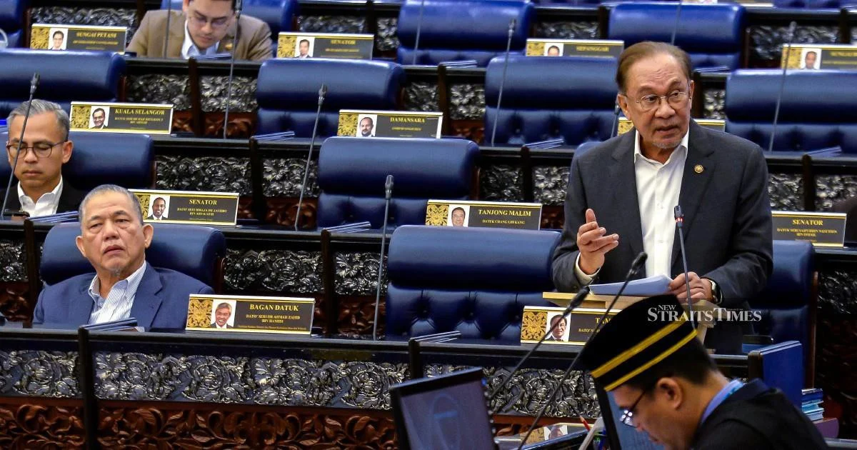 E-wallet Firms Must Compensate Fraud Victims if Security Failures Occur, Anwar Declares