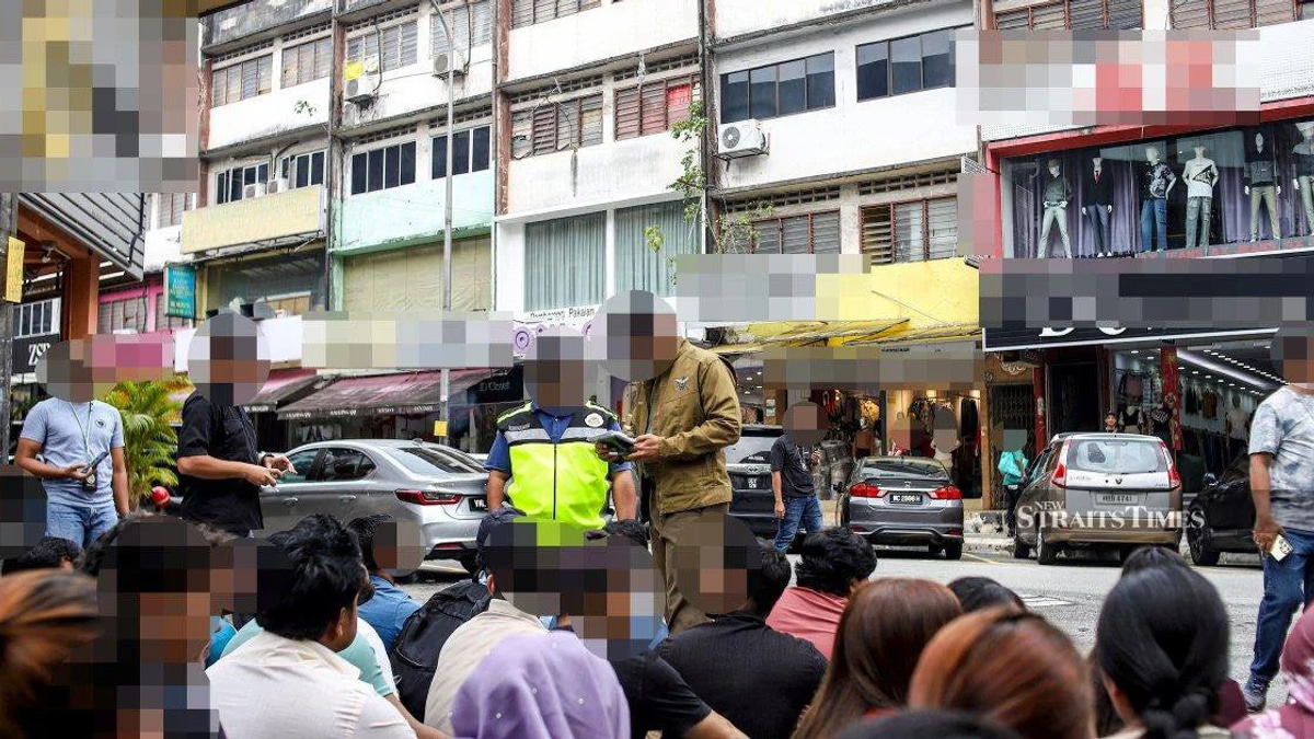 Immigration enforcement operation nets 111 undocumented migrants in Jalan Kenanga raid