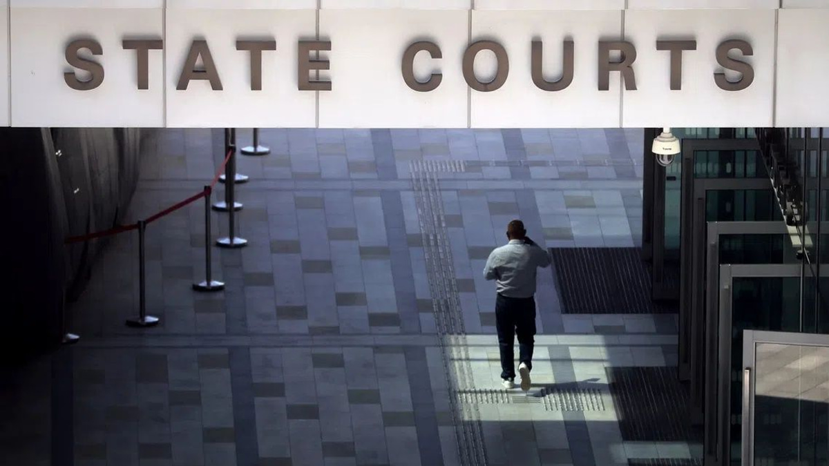 Singapore father charged with child abuse after allegedly forcing naked son to use lift, punching daughter