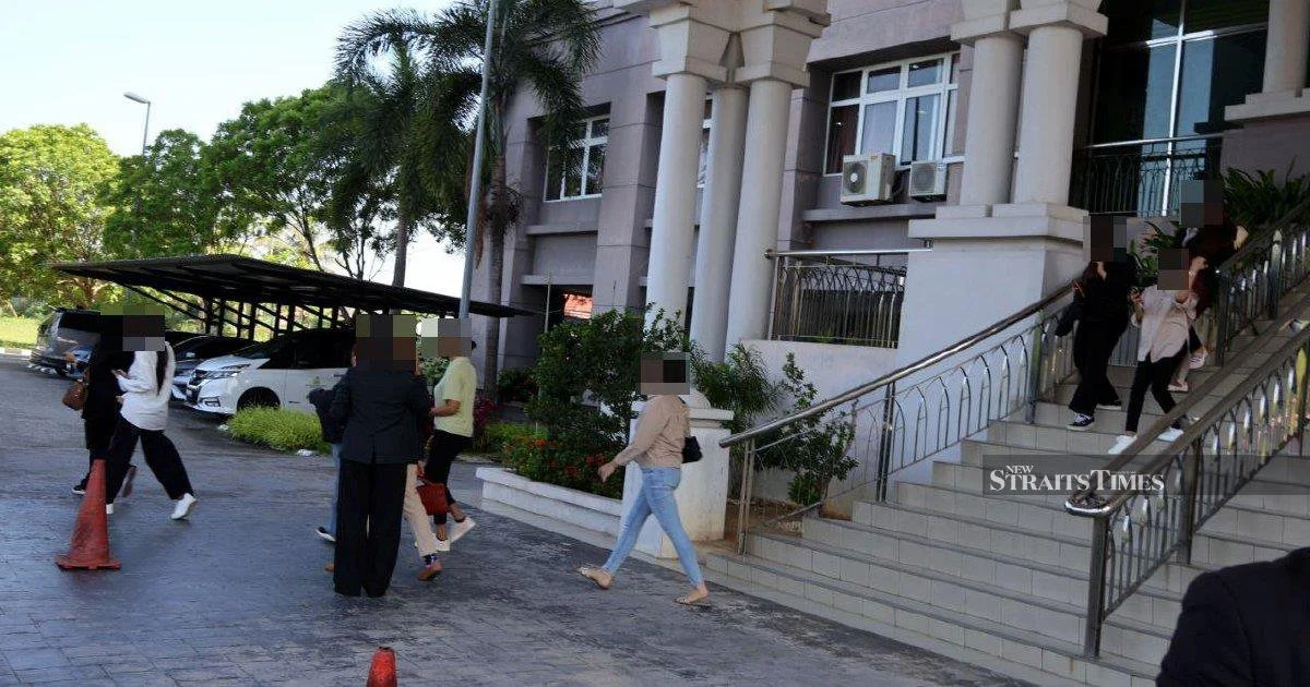 Trial of 14 men charged with cross-dressing postponed in Kota Baru Syariah Court