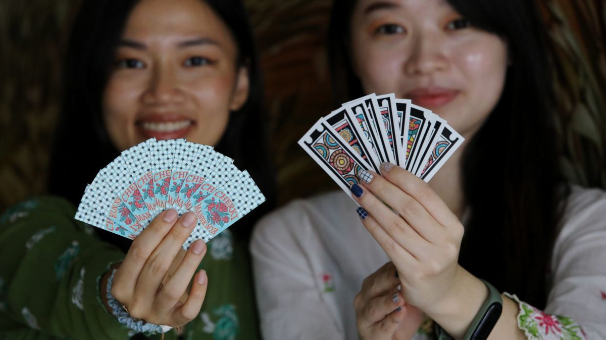 Sisters breathe new life into Cherki, a fading Peranakan card game