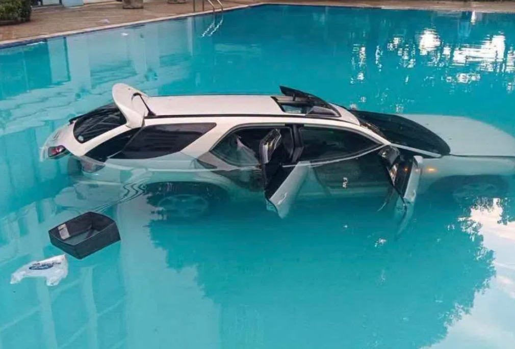 Thai man drives SUV into university pool over rent dispute with mother