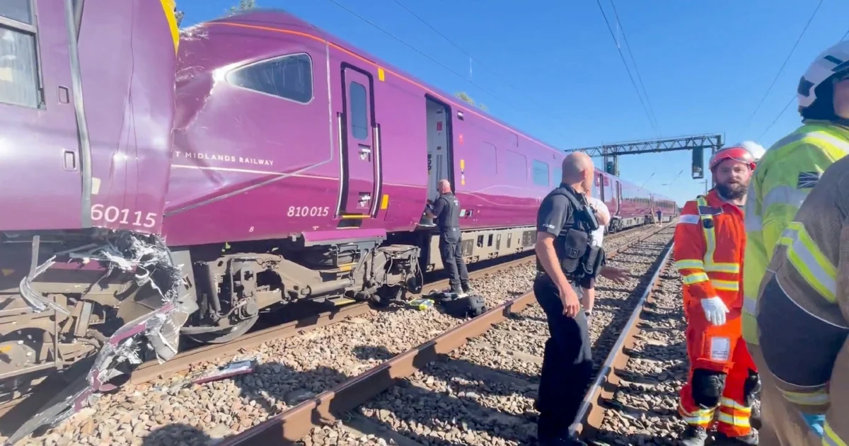 One dead, dozens injured as two passenger trains collide near London