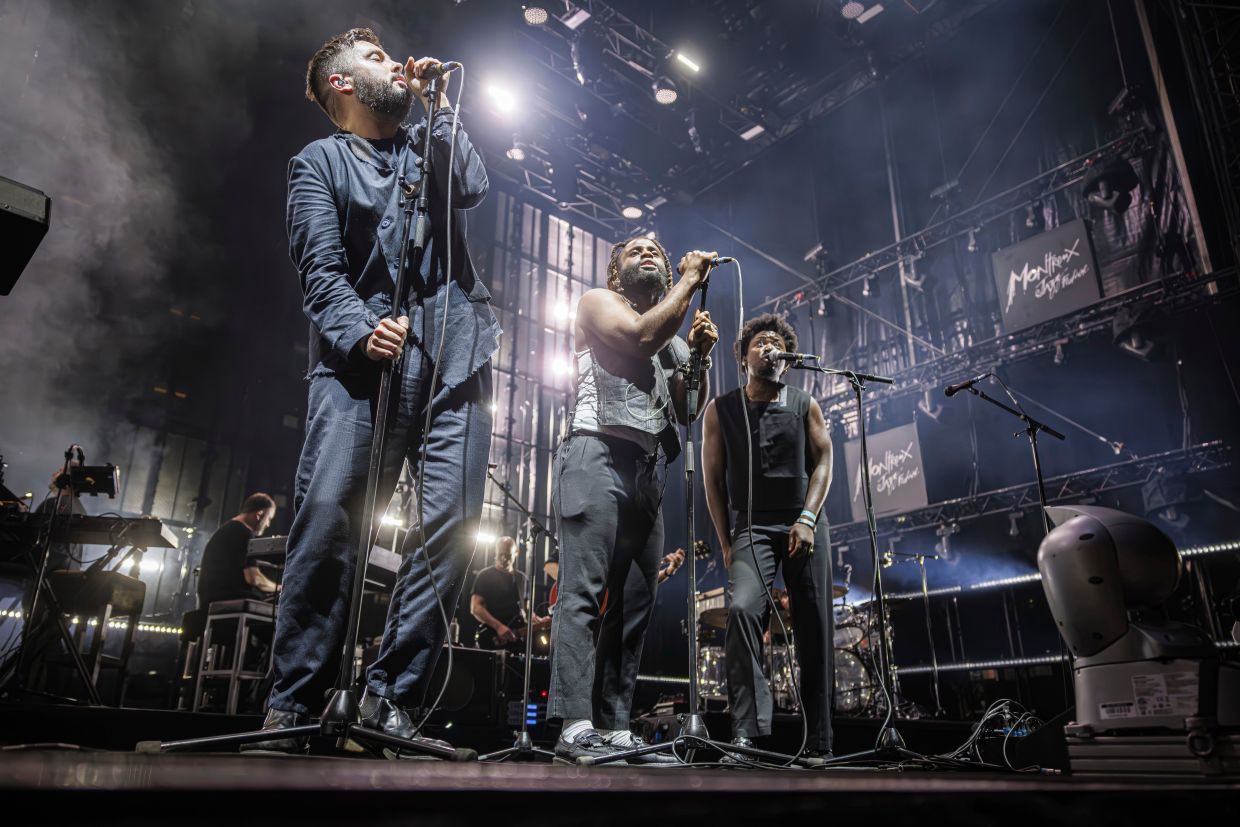 Massive Attack detained and questioned by Singapore police after Palestinian flag display at concert