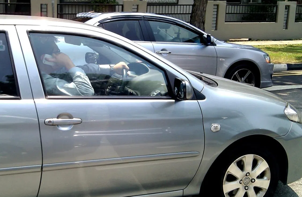 Singapore tightens driving laws with new penalties for phone use and reckless endangerment