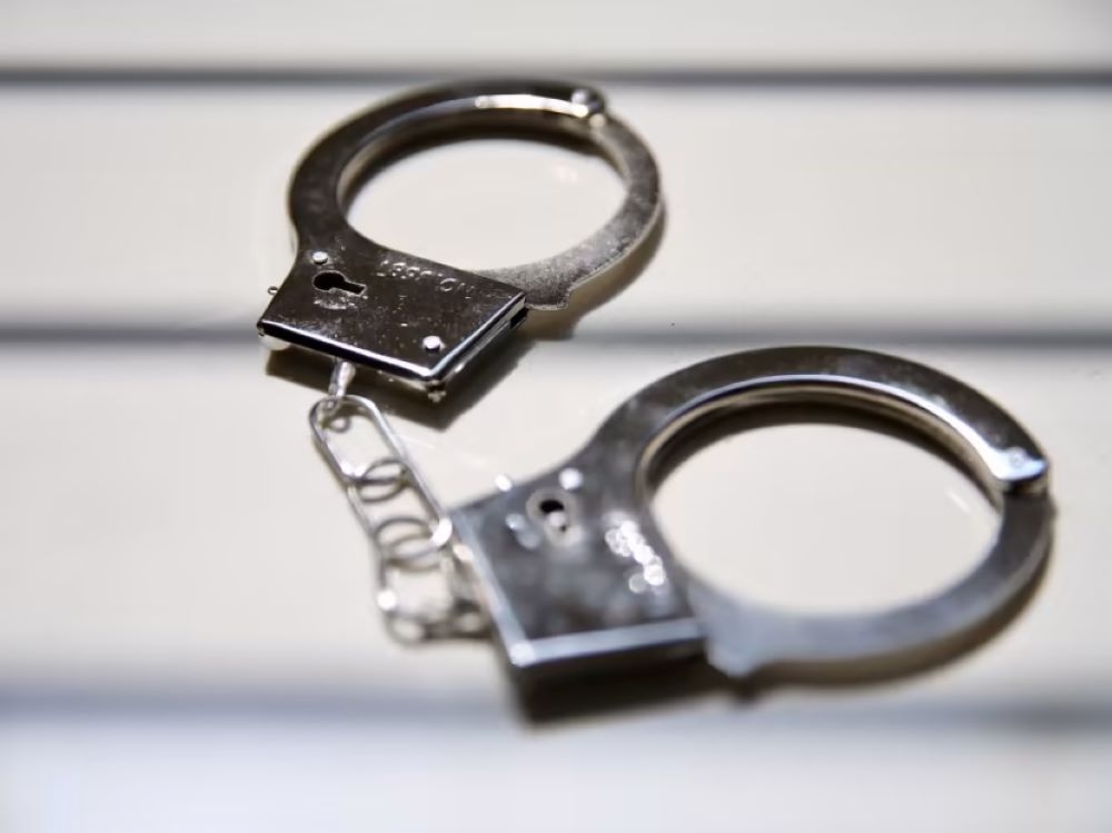 Activist Held in Seremban After Returning from Thailand