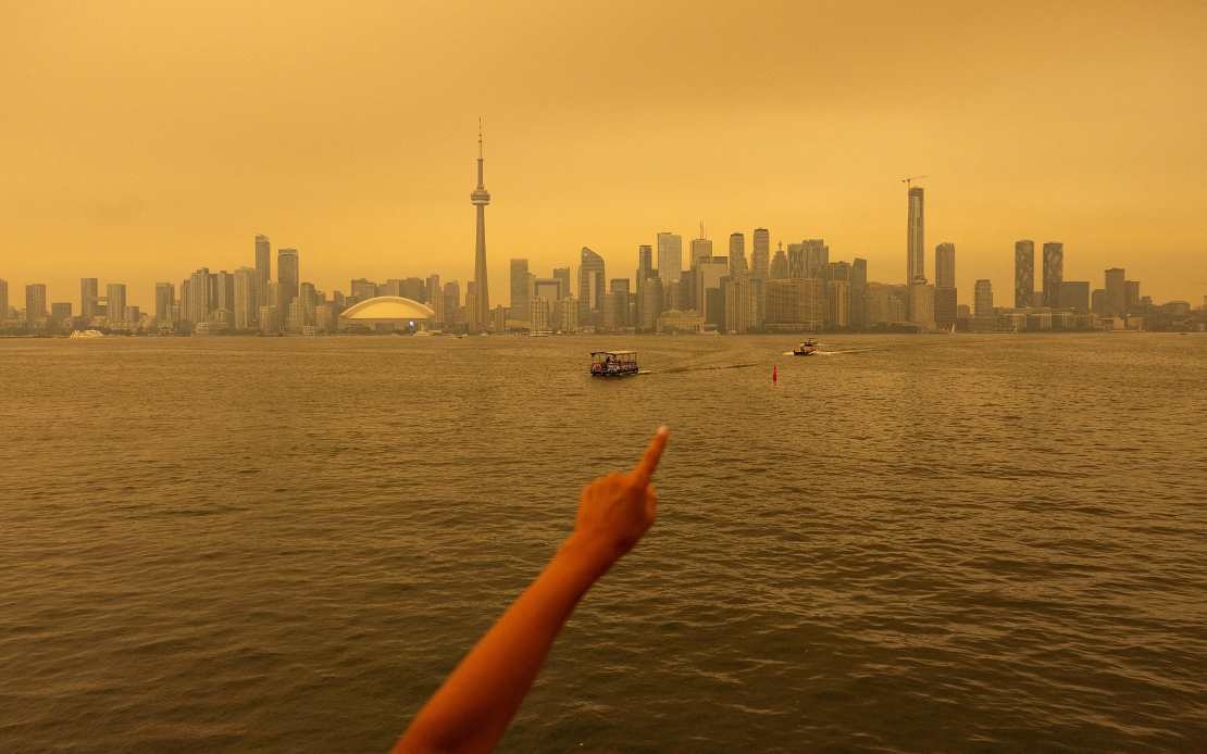 Ontario Wildfires Blanket Canada's Major Cities in Hazardous Smog, Halt Rail Services