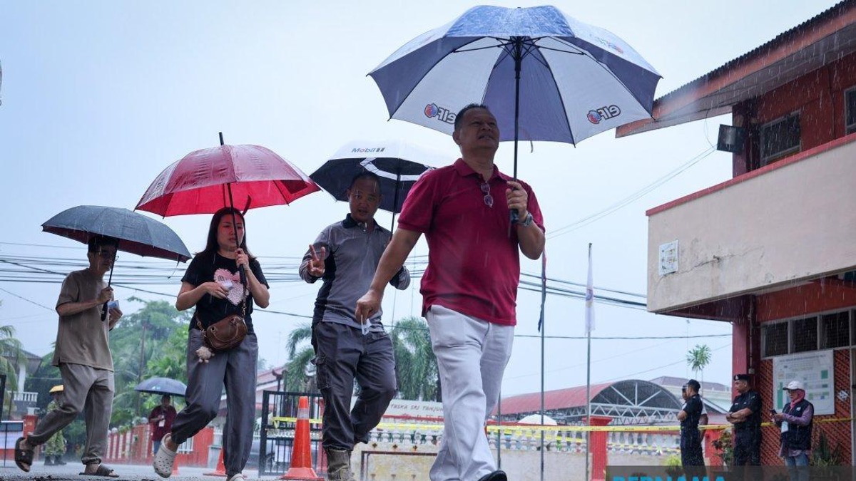Johor State Election Proceeds Smoothly Despite Heavy Rain in Muar District