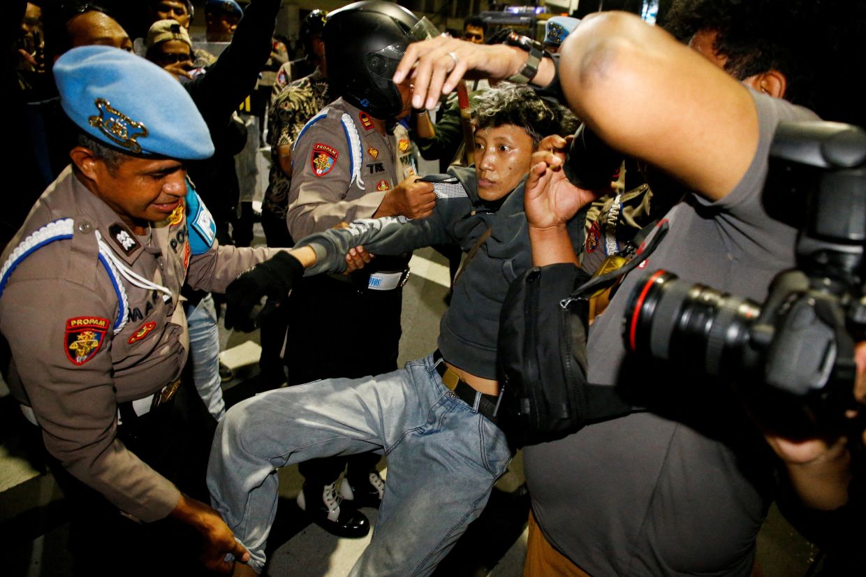 Indonesia charges four protesters over Surabaya anti-government rally